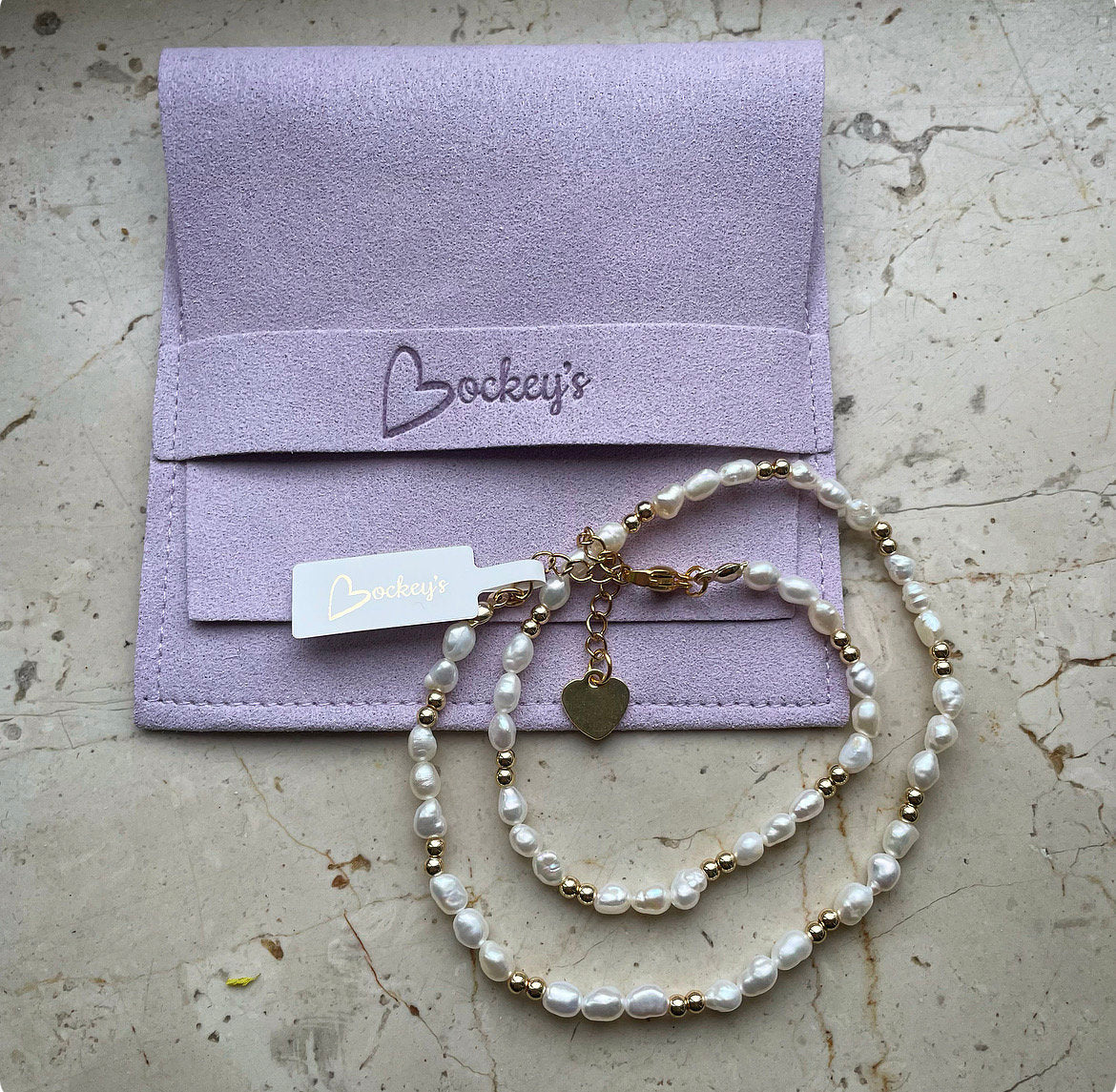 Classy freshwater pearls and gold-plated beads necklace with a stainless steel necklace set