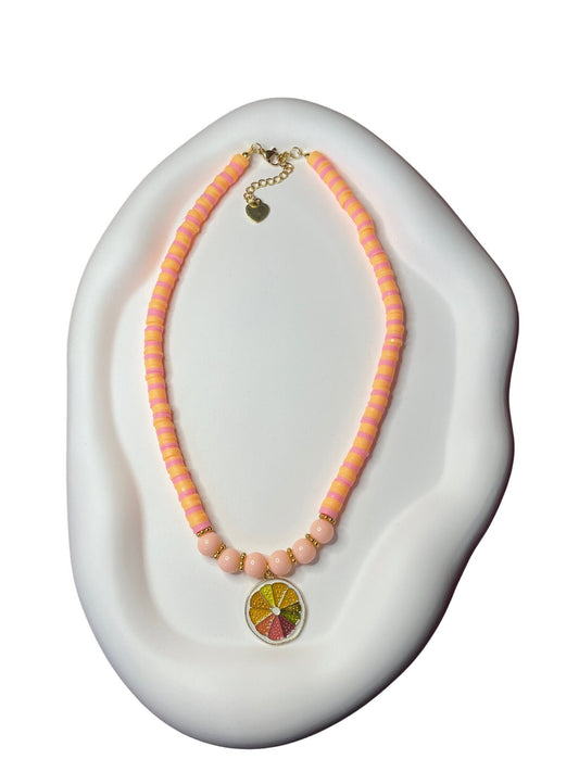 Colorful citrus beaded necklace with a charm