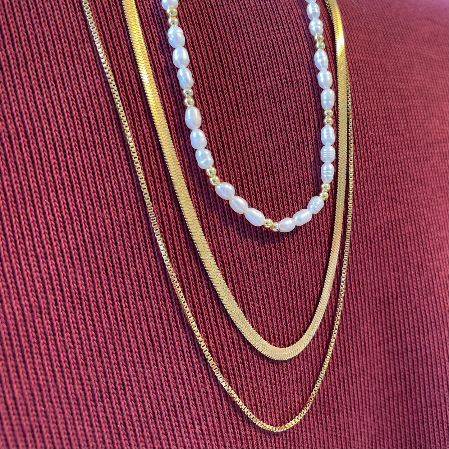 Classy freshwater pearls and gold-plated beads necklace with a stainless steel necklace set
